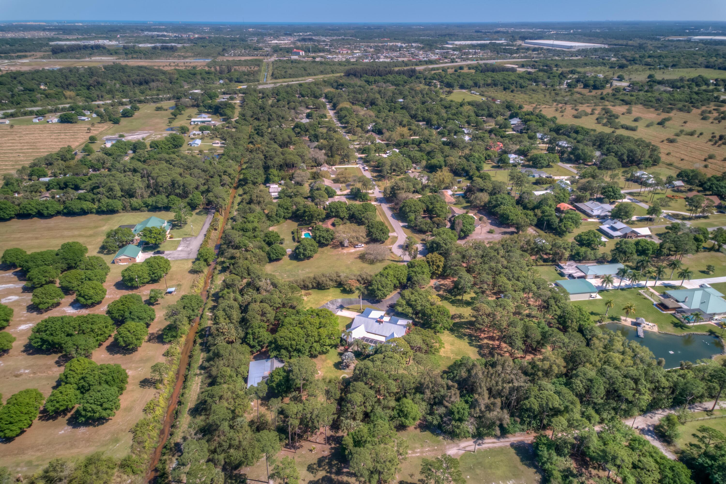 8850 Hidden Pines Road Fort Pierce, FL 34945 - Photo 70 of 72 an aerial view of multiple house