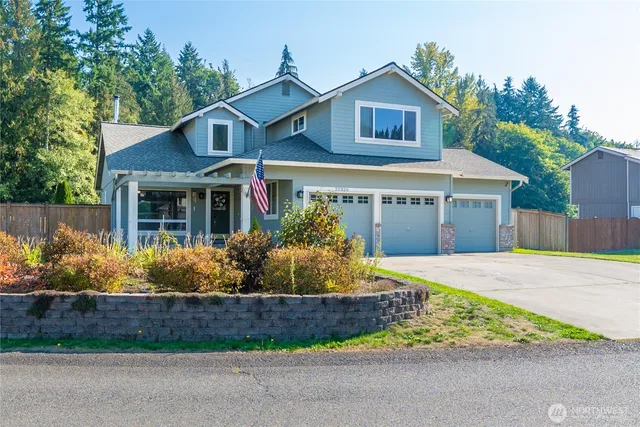 front view of a house with a yard