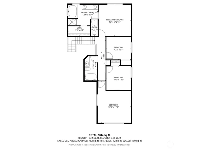 a view of a house with a yard balcony and fence
