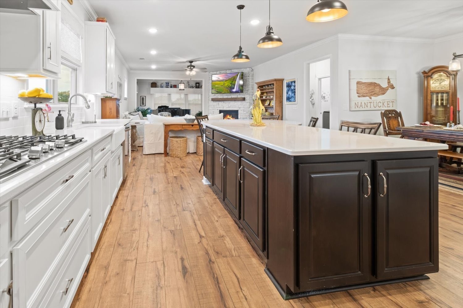 1055 Sumner Grove Spring Hill, TN 37174 - Photo 13 of 48 a large kitchen with stainless steel appliances granite countertop a lot of counter space and wooden floors