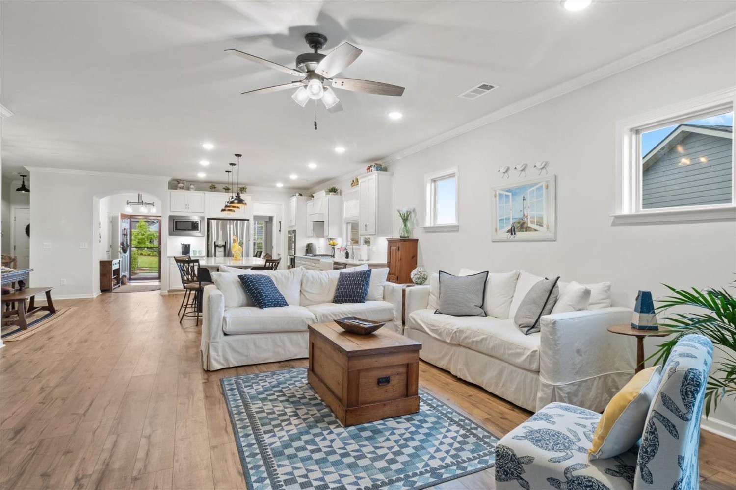1055 Sumner Grove Spring Hill, TN 37174 - Photo 17 of 48 a living room with furniture and a chandelier