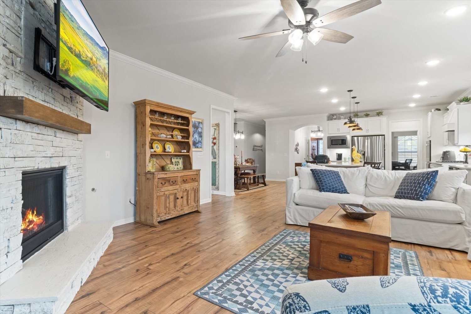 1055 Sumner Grove Spring Hill, TN 37174 - Photo 18 of 48 a living room with furniture and a fireplace