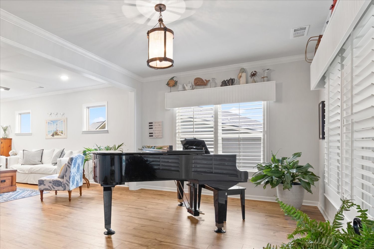 1055 Sumner Grove Spring Hill, TN 37174 - Photo 20 of 48 a living room with furniture a potted plant and a large window
