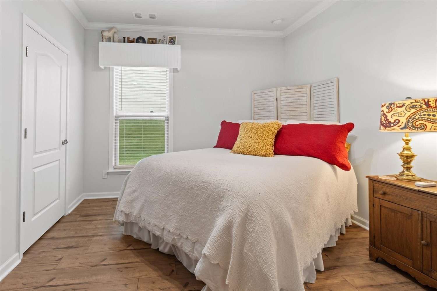 1055 Sumner Grove Spring Hill, TN 37174 - Photo 27 of 48 a bedroom with a bed and a window