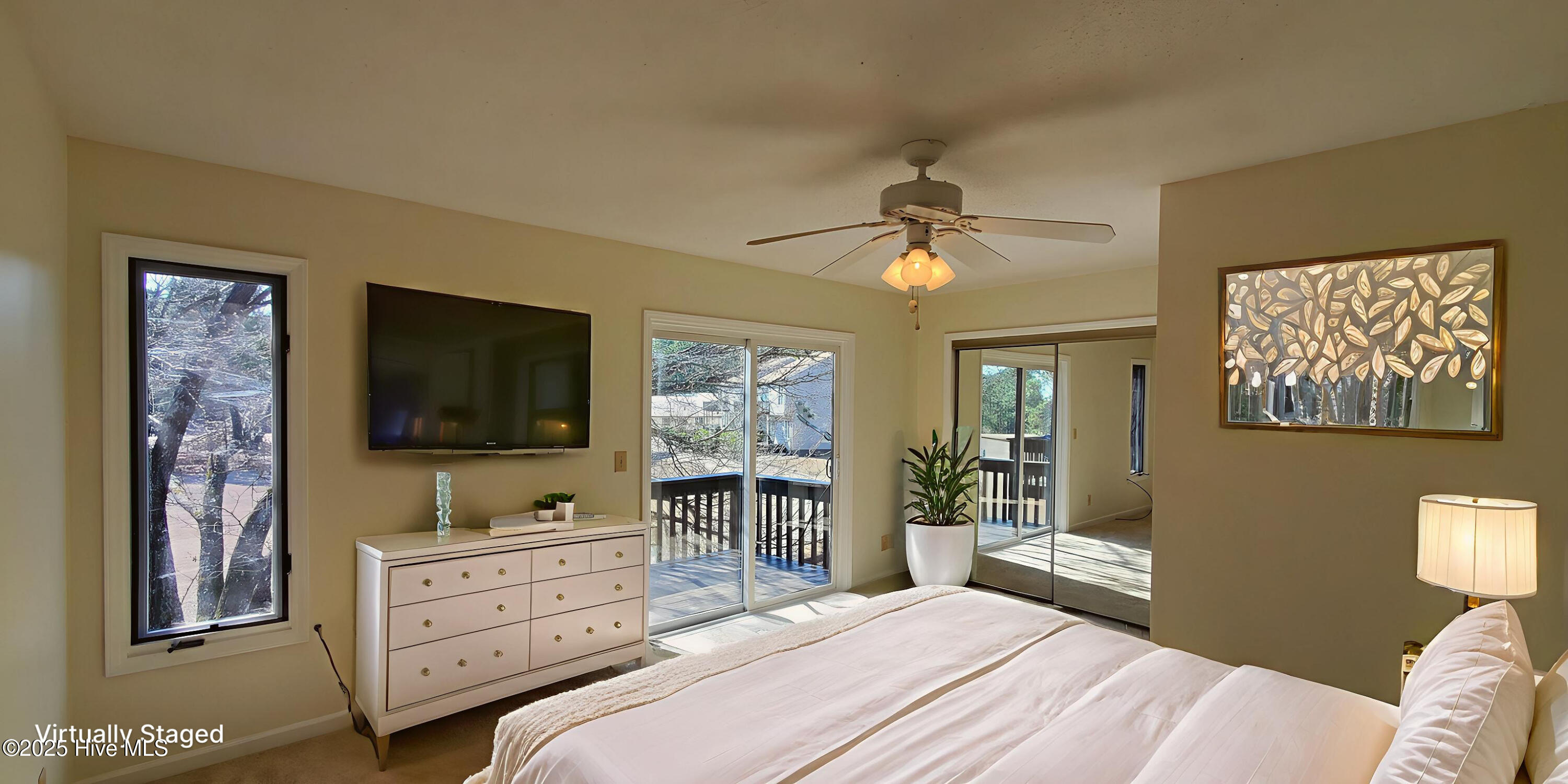 234 Persimmon Drive, Unit C Pinebluff, NC 28373 - Photo 1 of 22 The master suite is a true retreat, boasting a private balcony perfect for morning coffee or evening relaxation.