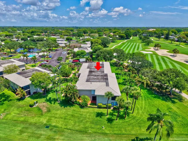 a view of a lake with a yard