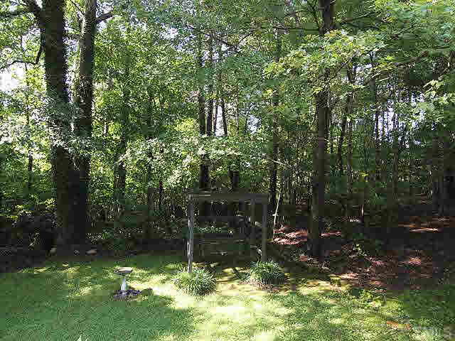 2713 Sherborne Place Raleigh, NC 27612 - Photo 22 of 25 Enjoy your garden swing! Remember you have private septic and well so you save money by not paying for those city services! Or you may tap to the city water and sewer in close proximity.