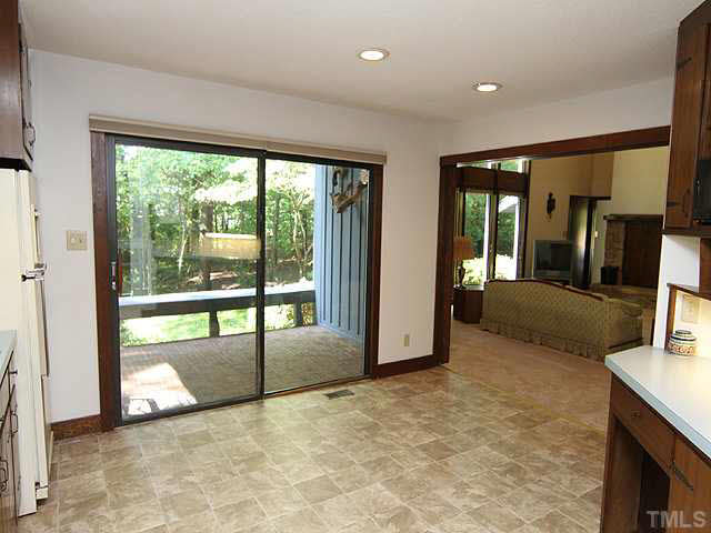2713 Sherborne Place Raleigh, NC 27612 - Photo 8 of 25 Imagine a good sized round table in front of the right glass door. There is plenty of room! Enjoy walking out in the morning, sitting on your porch and reading the paper or drinking coffee! Enjoy your music through speakers at night with cool fan breeze.