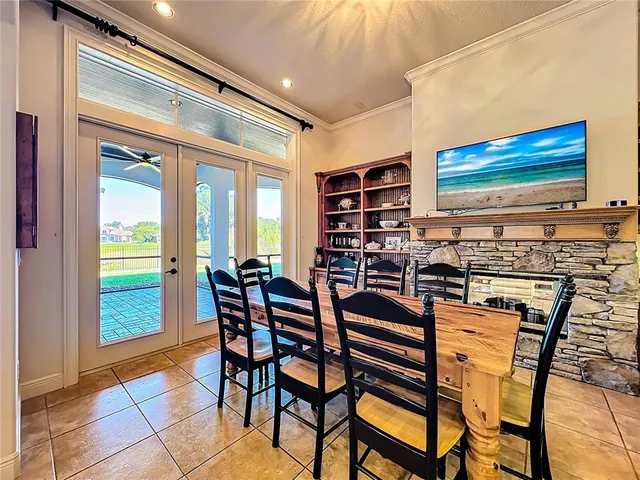 a view of a house with a yard and pathway