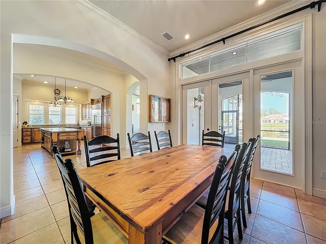 an aerial view of a houses with a lake view