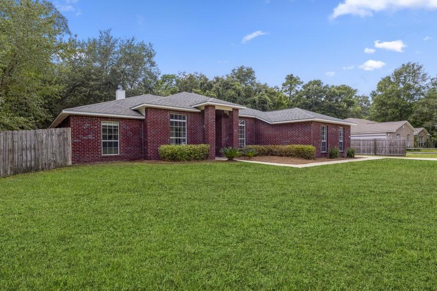 87 Oak Place Road Freeport, FL 32439 - Photo 1 of 44 02_87-Oakplace-Road_2003_Web