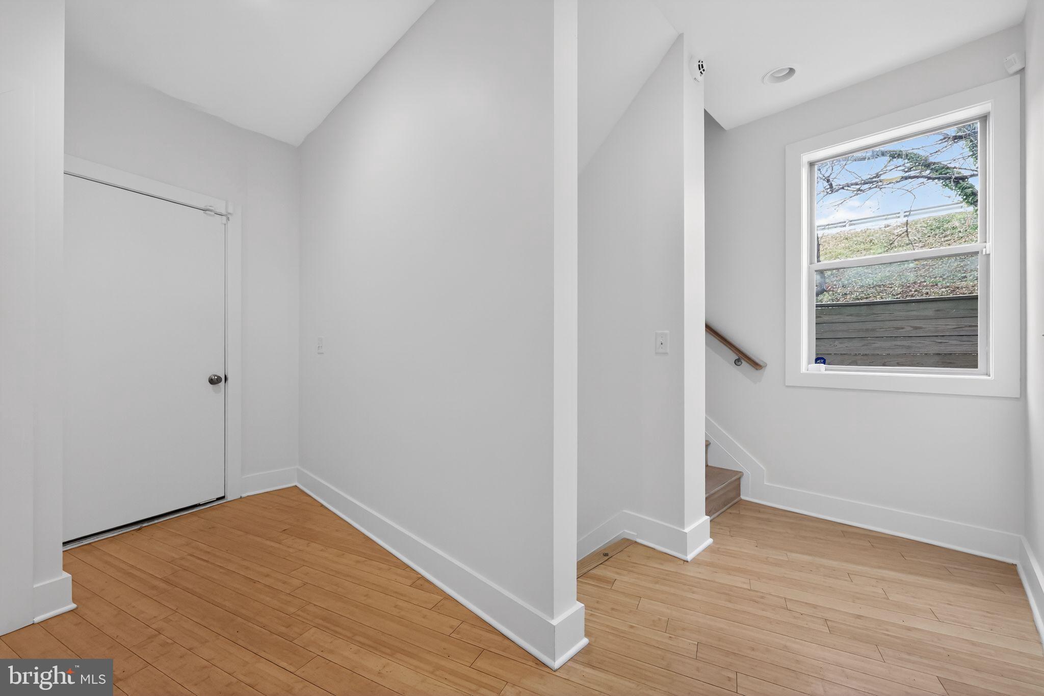 920 North Front Street Philadelphia, PA 19123 - Photo 12 of 28 a view of empty room with wooden floor and fan