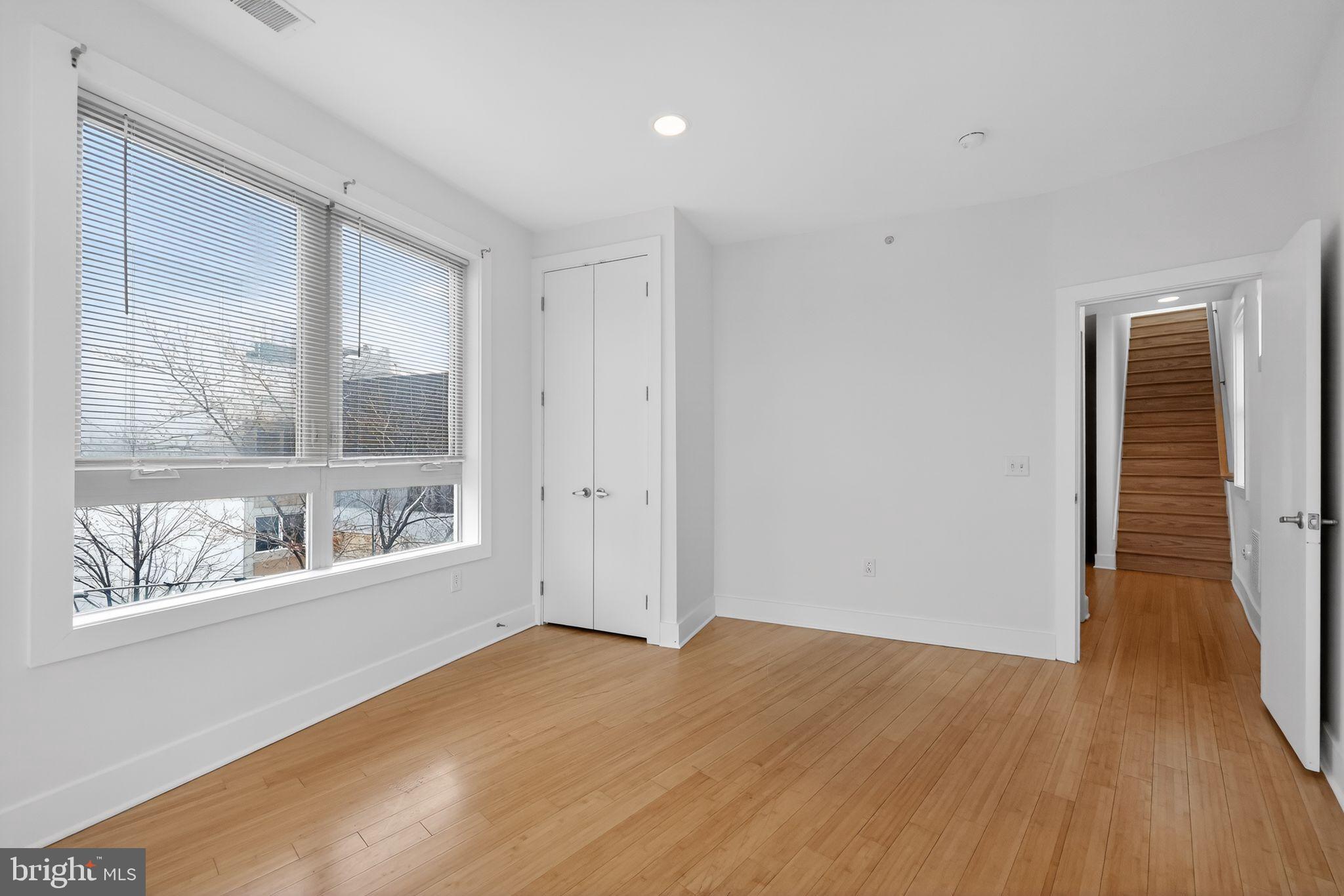 920 North Front Street Philadelphia, PA 19123 - Photo 22 of 28 a view of empty room with wooden floor and fan