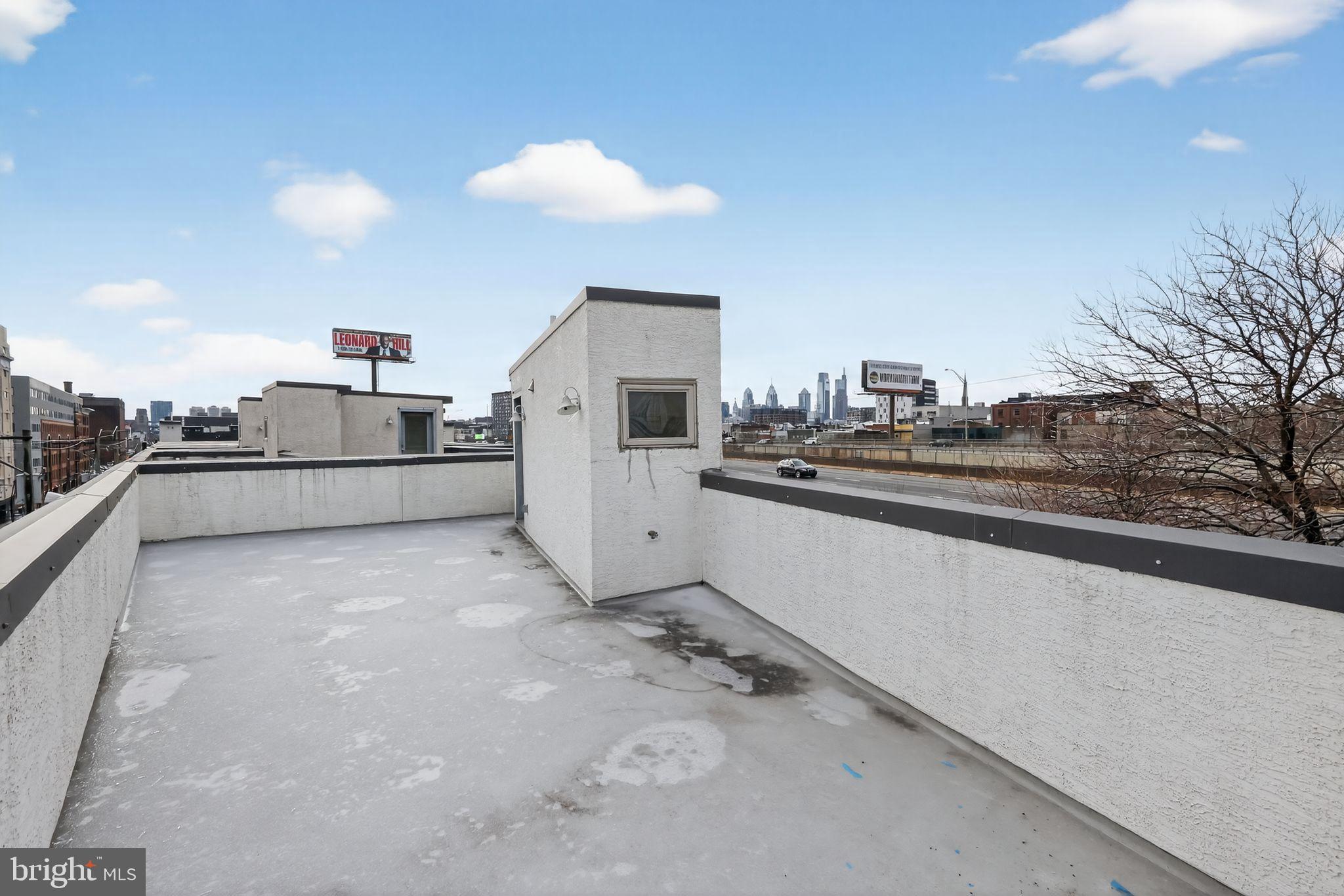 920 North Front Street Philadelphia, PA 19123 - Photo 25 of 28 a kitchen with cabinets and a sink