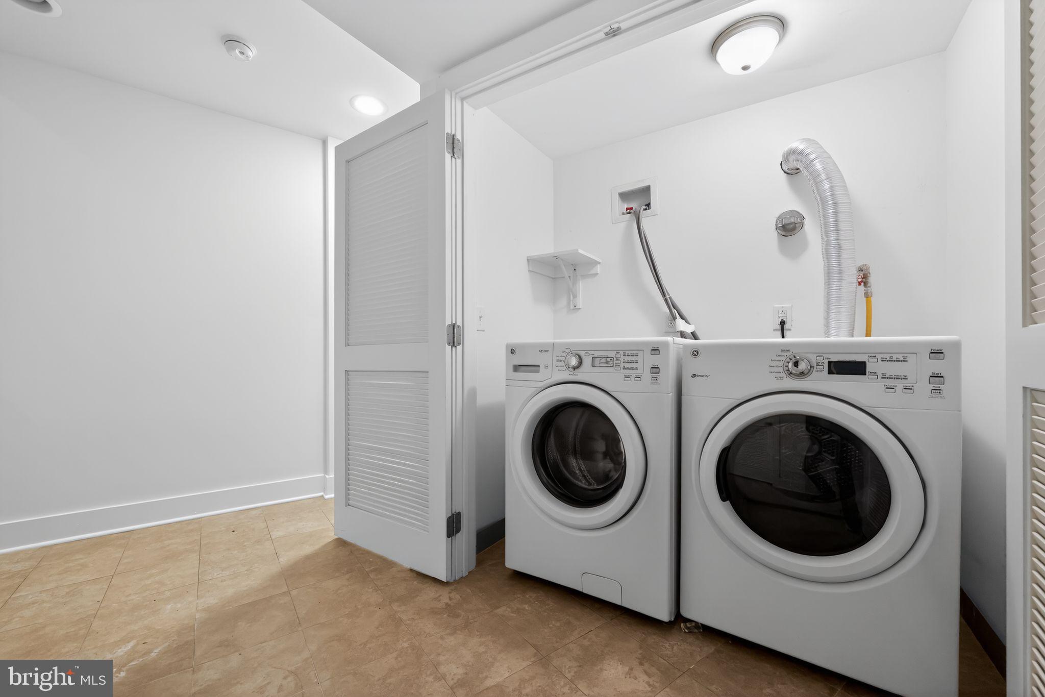 920 North Front Street Philadelphia, PA 19123 - Photo 28 of 28 a view of a storage & utility room with a washer dryer