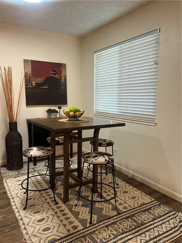 a view of a workspace with furniture