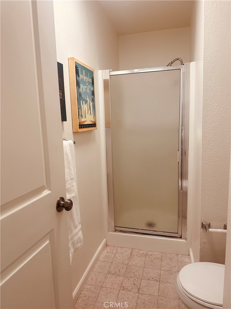 1412 North Cherry Street, Unit 9 Chico, CA 95926 - Photo 6 of 12 a bathroom with a shower and a toilet