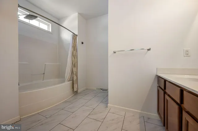 a bathroom with a bathtub