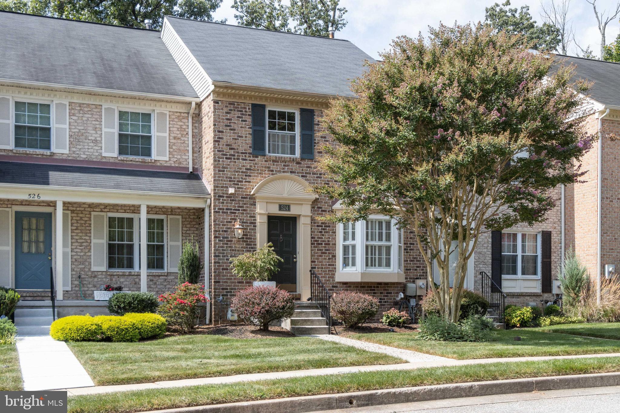524 Kinsale Road Lutherville-Timonium, MD 21093 - Photo 1 of 22 a front view of a house with yard outdoor seating and plants
