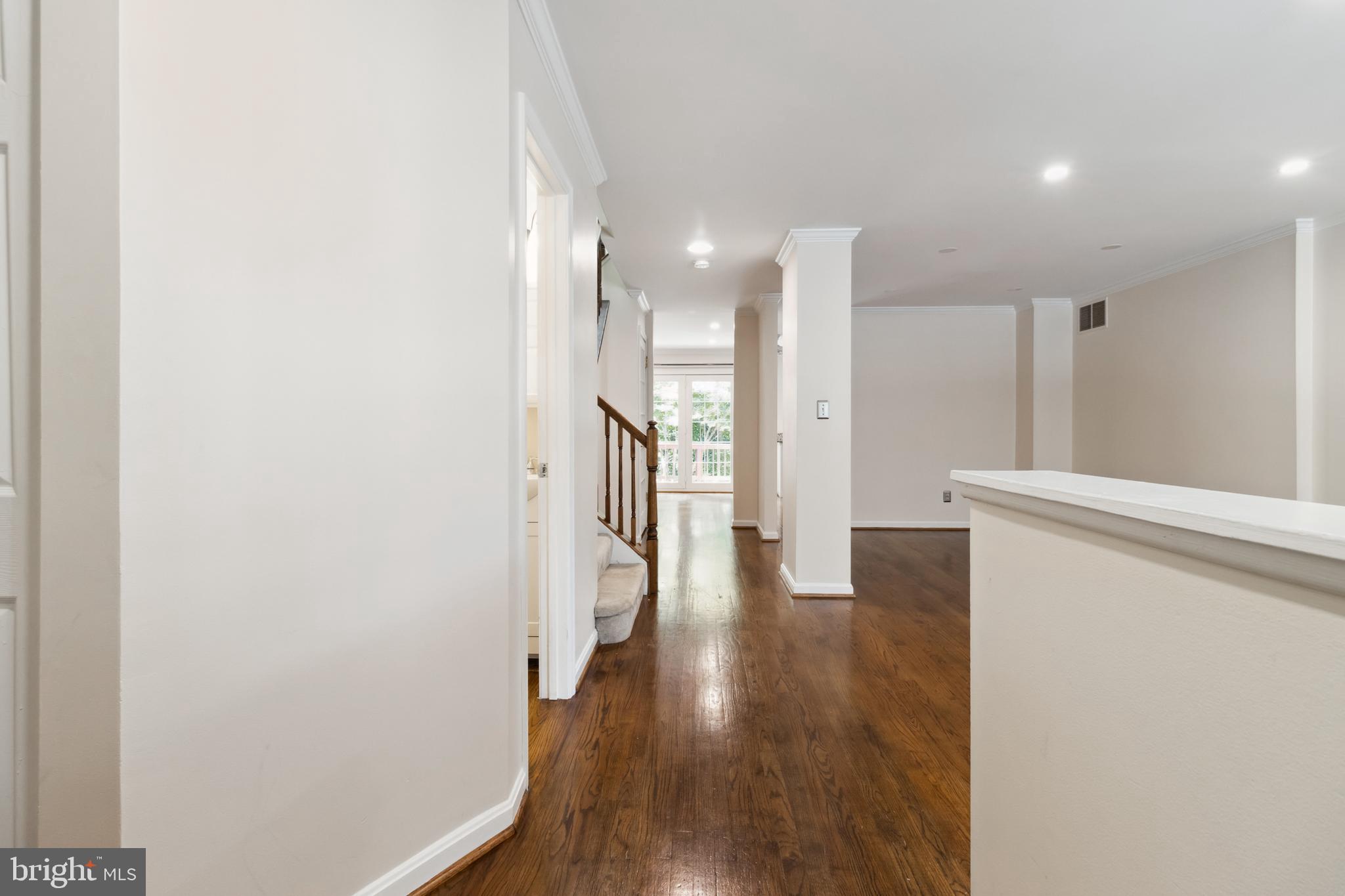 524 Kinsale Road Lutherville-Timonium, MD 21093 - Photo 2 of 22 a view of a hallway with wooden floor