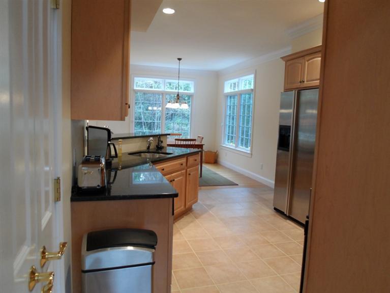 166 Cairn Ridge Road East Falmouth, MA 02536 - Photo 9 of 25 a view of a kitchen cabinets and a counter place