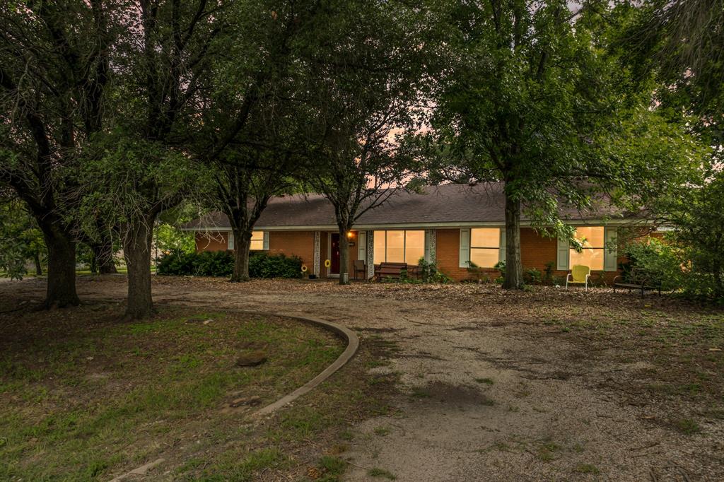 609 South Files Street Itasca, TX 76055 - Photo 1 of 1 a view of a house with a yard