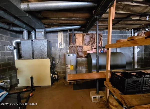 a view of storage and utility room