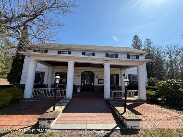 a view of a building with a patio