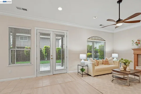 a living room with furniture and a window
