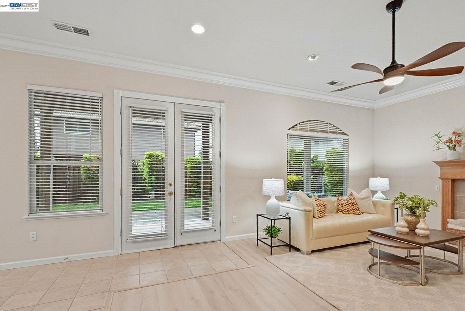 663 Clay Way Ripon, CA 95366 - Photo 12 of 43 a living room with furniture and a window