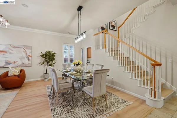 a work room with furniture and wooden floor