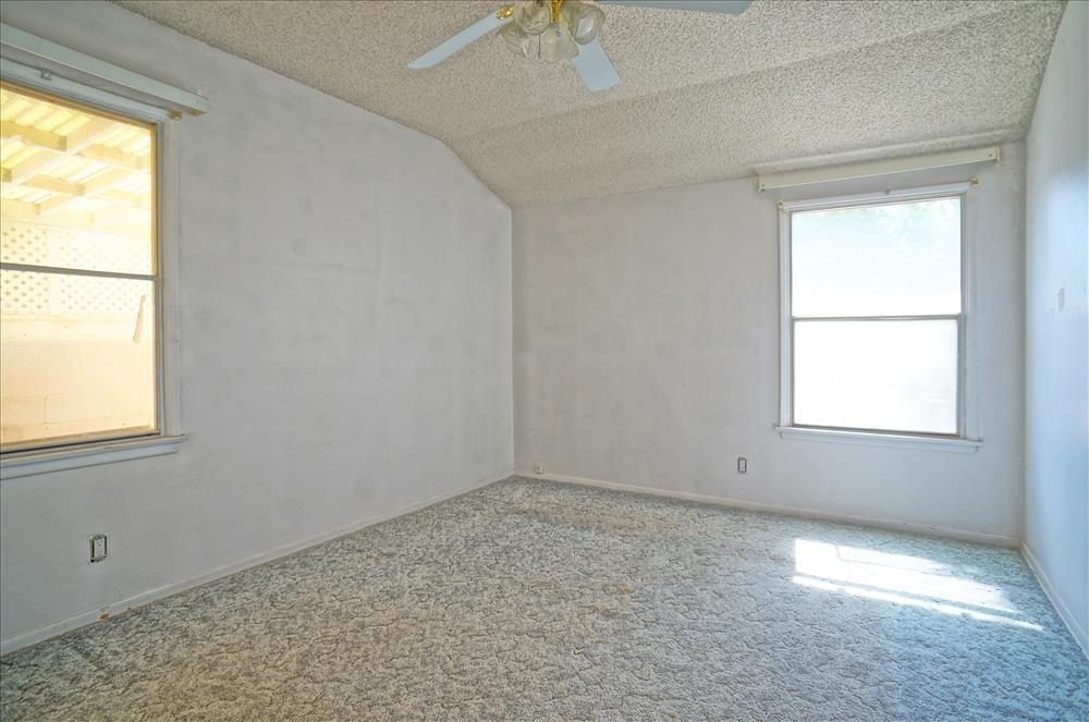 43879 Fig Avenue Lancaster, CA 93534 - Photo 11 of 11 an empty room with a window