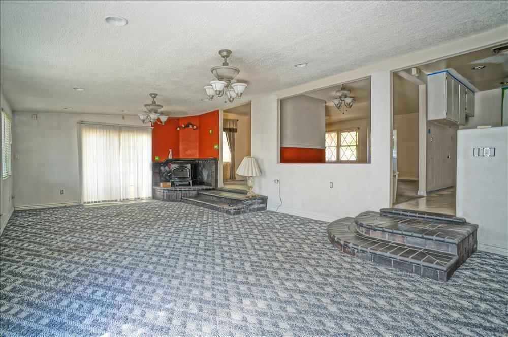 43879 Fig Avenue Lancaster, CA 93534 - Photo 5 of 11 a living room with a couch