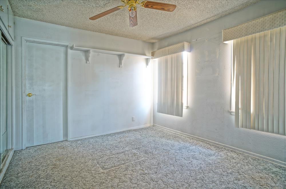 43879 Fig Avenue Lancaster, CA 93534 - Photo 9 of 11 a view of an empty room with a window