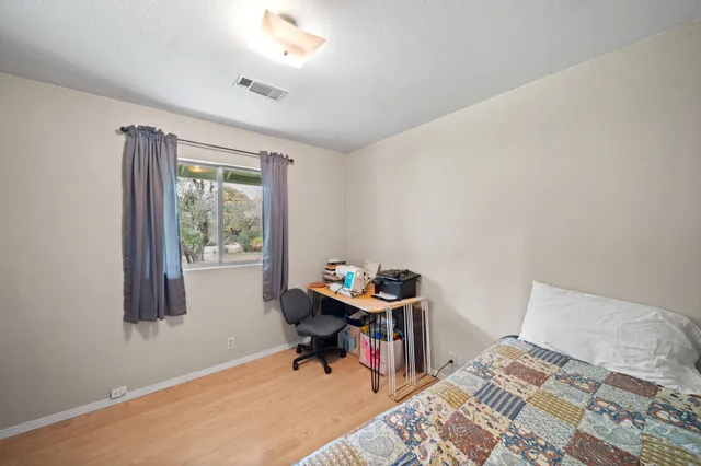 a view of a backyard with a trees