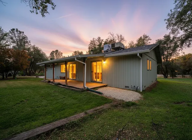 a view of a back yard of the house
