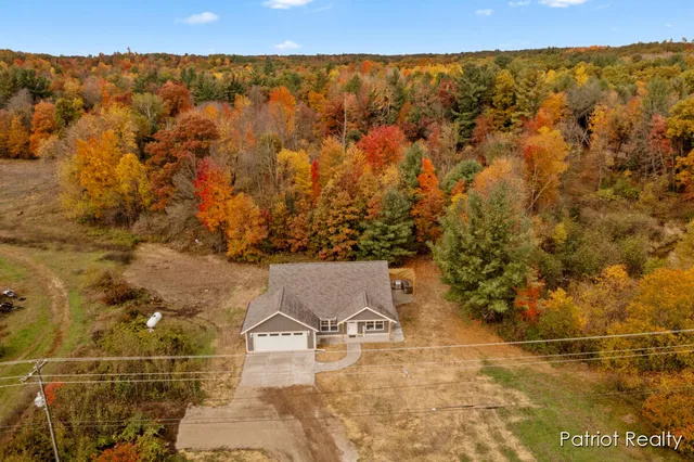 $399,900 | 5263 Bass Lake Road, Pierson, MI 49339