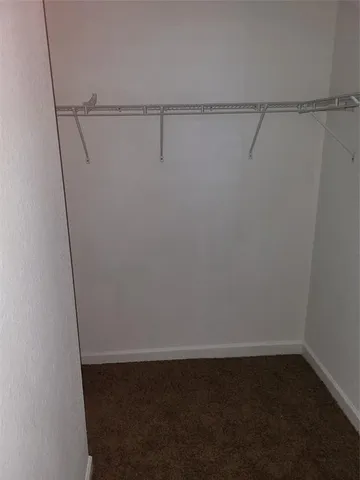 a view of small space with racks on the wall