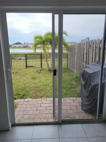 a view of a porch with a yard