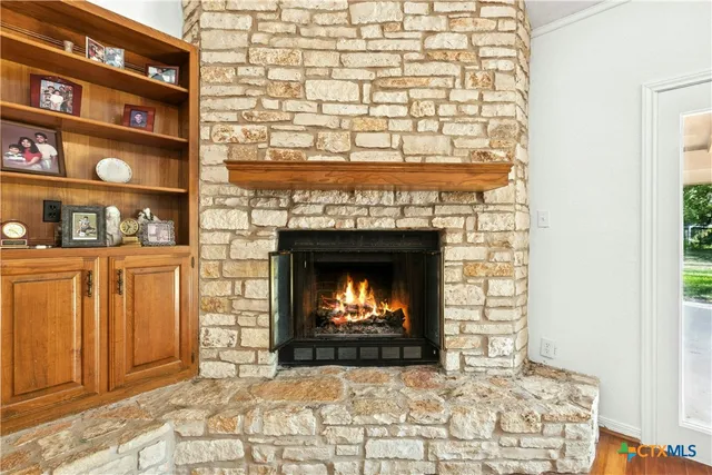 a living room with a fireplace