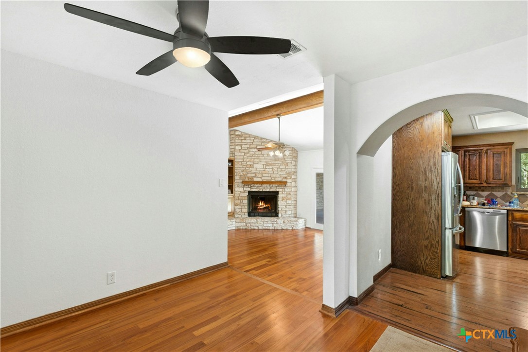 3502 Apache Forest Drive Austin, TX 78739 - Photo 16 of 34 a view of empty room with wooden floor