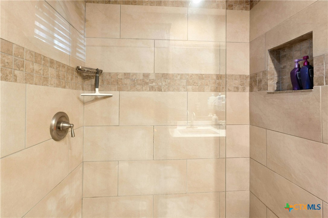 3502 Apache Forest Drive Austin, TX 78739 - Photo 27 of 34 a bathroom with a shower