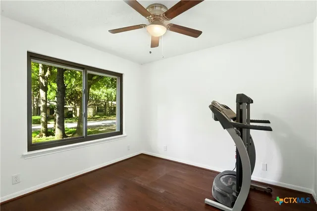 a view of room with gym equipment