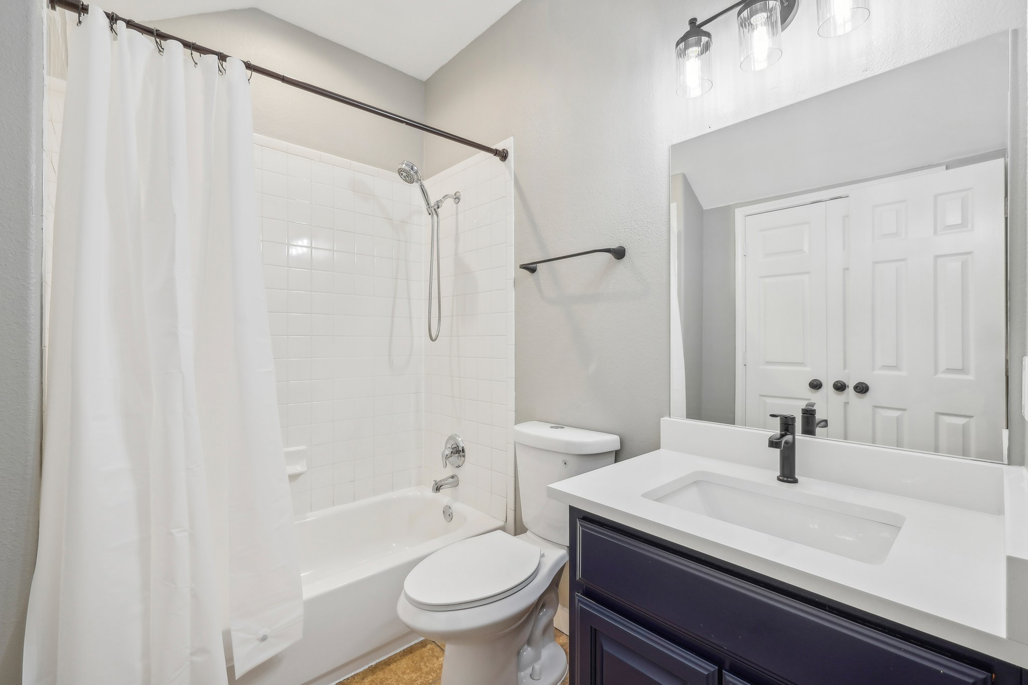 7324 Moon Rock Road Austin, TX 78739 - Photo 24 of 30 a bathroom with a sink toilet and shower