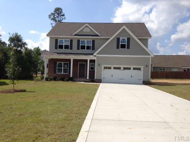 30 Historian Point Cameron, NC 28326 - Photo 1 of 5 a front view of a house with a yard