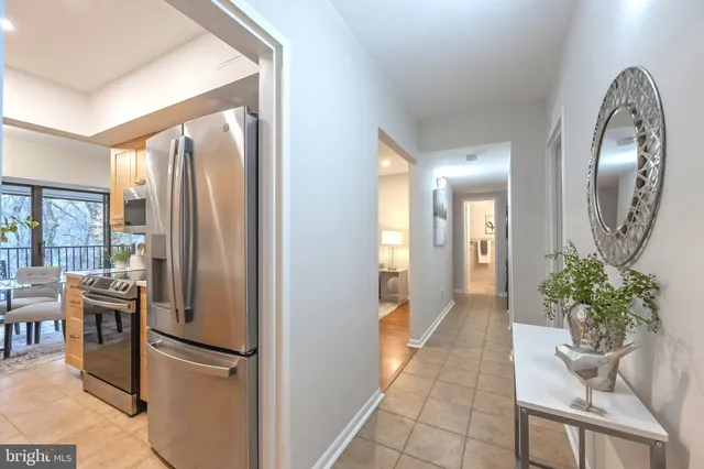 a view of a livingroom with furniture and front door