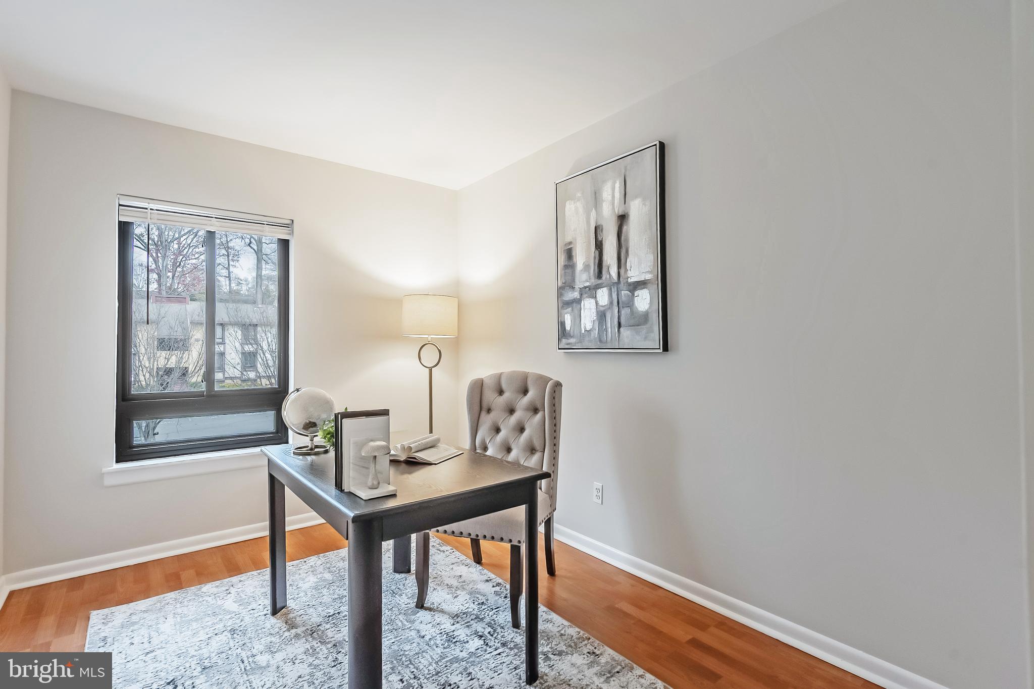 11657 Stoneview Square, Unit 97/22C Reston, VA 20191 - Photo 22 of 28 a workspace with furniture and window