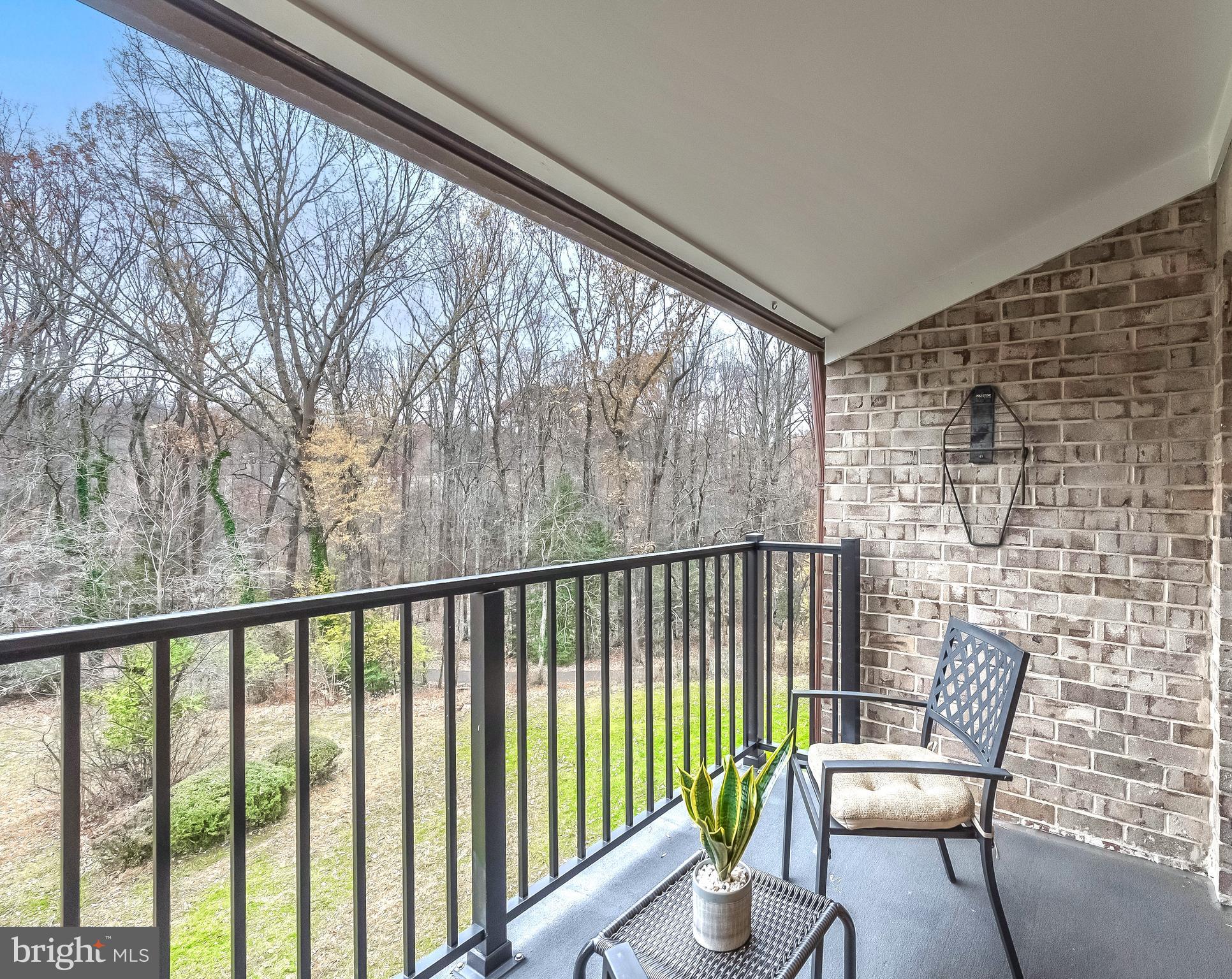 11657 Stoneview Square, Unit 97/22C Reston, VA 20191 - Photo 27 of 28 a view of a two chairs in the balcony