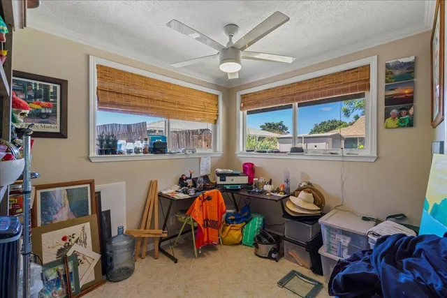 a room with furniture a rug and a window