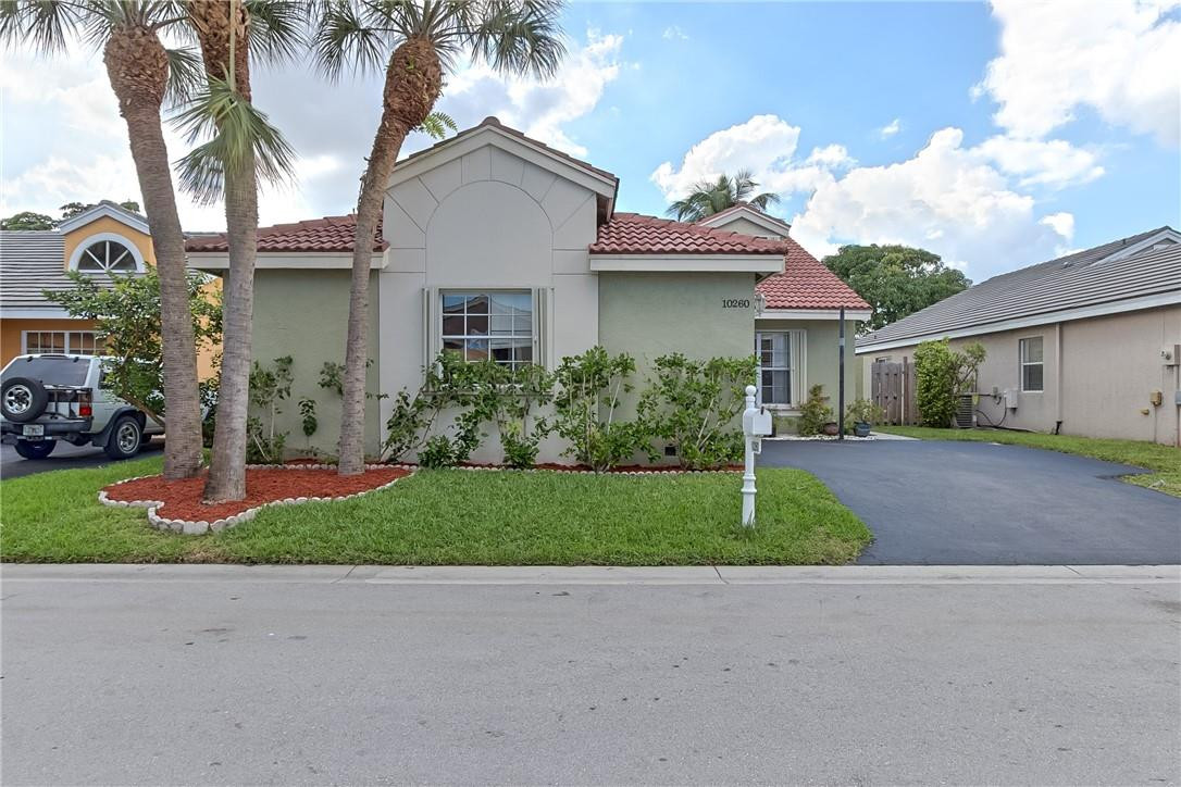 10260 Allegro Drive Boca Raton, FL 33428 - Photo 3 of 32 beautifully landscaped. Gated community.